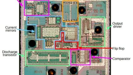 Reverse engineering the popular 555 timer chip (CMOS version)