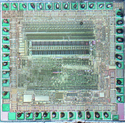 Reverse Engineering a Simple Four Function Calculator: die decap