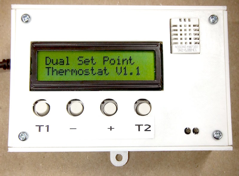 Dual set point programmable thermostat