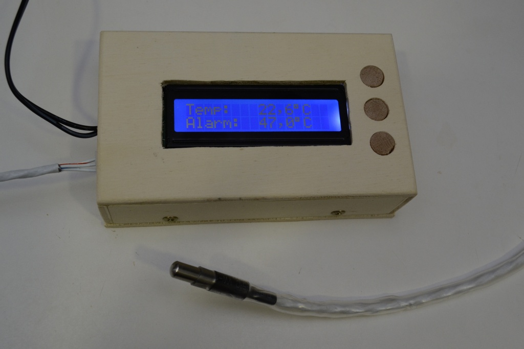 Temperature alarm for boiling milk