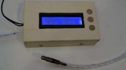 Temperature alarm for boiling milk