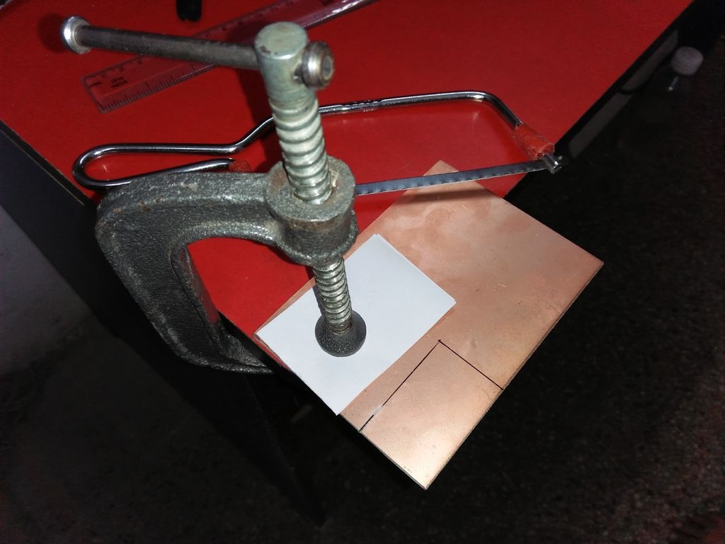 Cut the copper clad board using a hacksaw