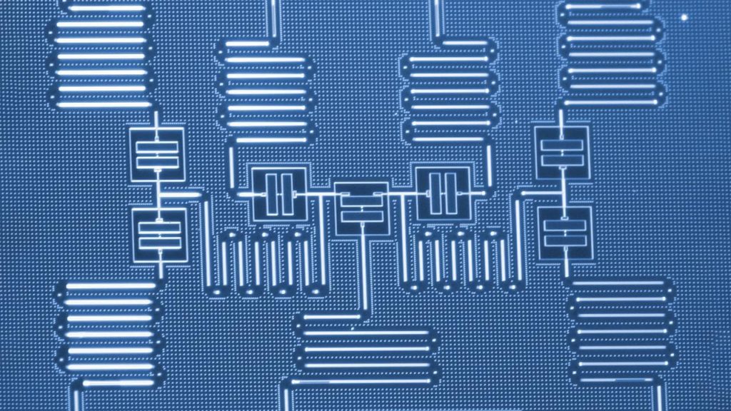 Three quantum computer components integrated on one chip