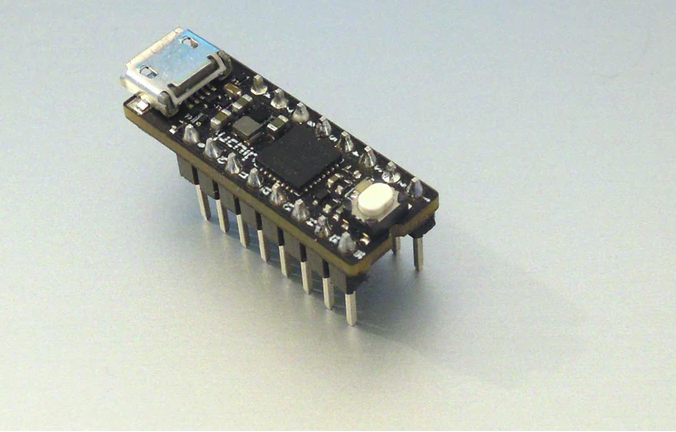 uChip: Arduino Zero compatible in a narrow DIP-16 package!