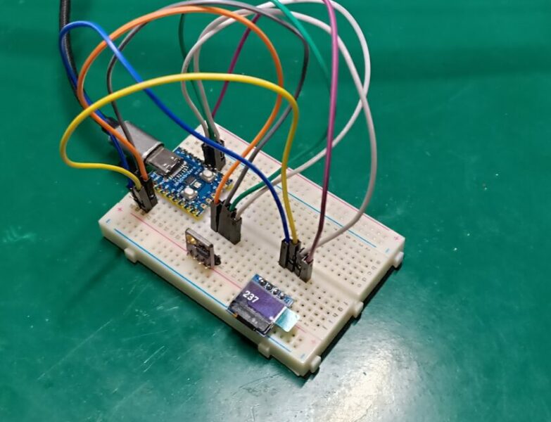 Laser distance sensor with OLED display and RP2040