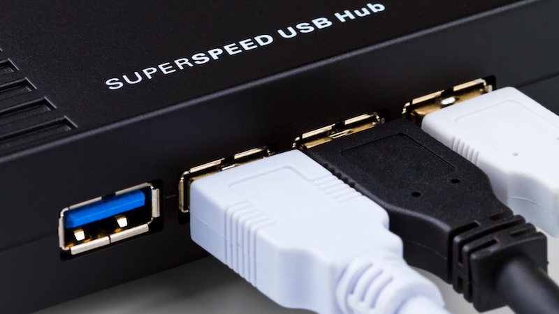 Plugs connected into a USB hub.